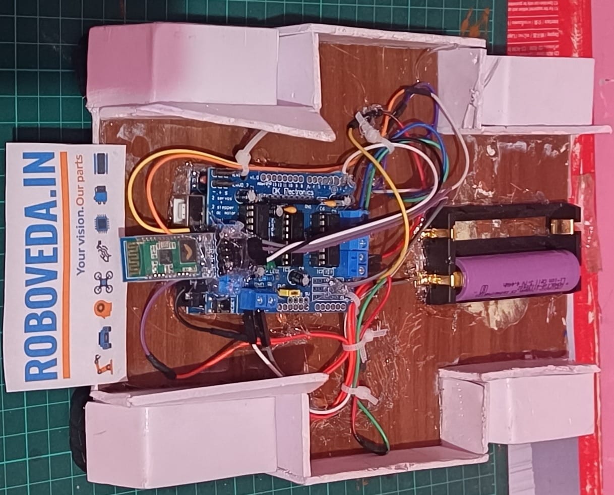 Bluetooth Controlled Car Using Arduino With Report File 